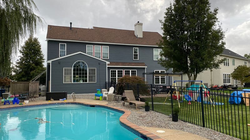 board and batten siding replacement on farmhouse
