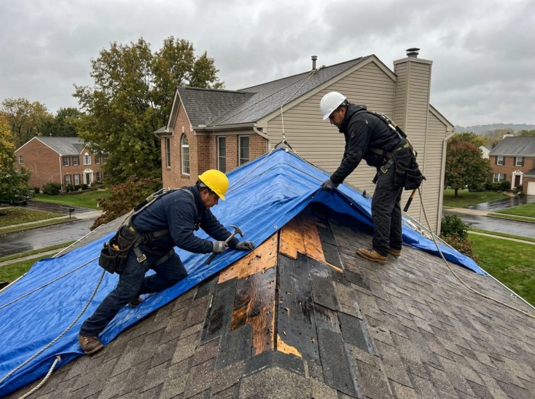 Professional roofer with tool belt preparing for slate roof repair in Philadelphia